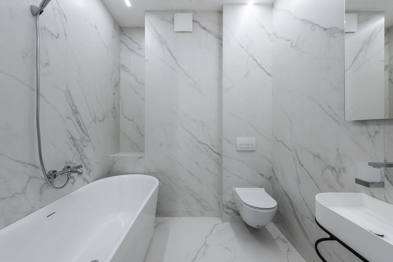 A spotless finished marble bathroom
